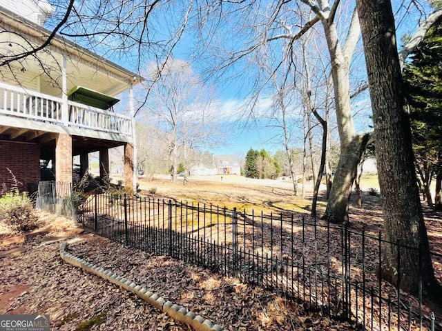 view of yard featuring fence