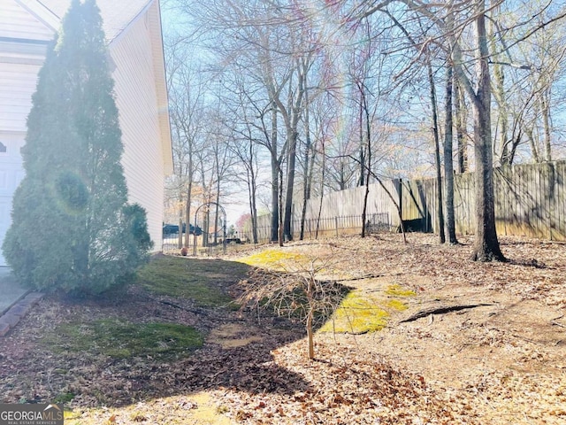 view of yard with fence