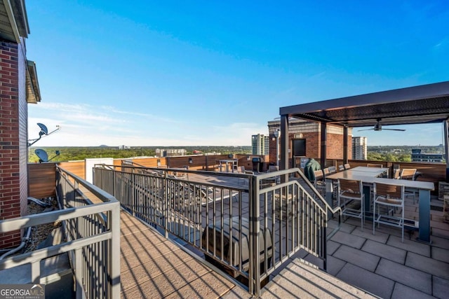 3180 Mathieson Dr NE Unit 703, Atlanta, GA 30305 - wooden terrace with a ceiling fan and outdoor dining space