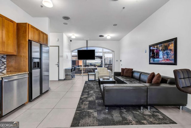 3180 Mathieson Dr NE Unit 703, Atlanta, GA 30305 - living room featuring light tile patterned flooring and visible vents