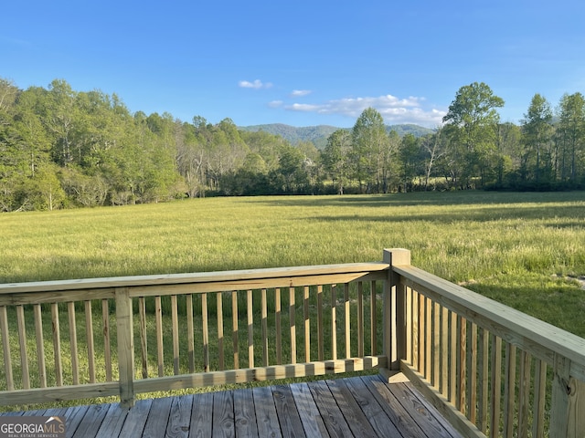 5.765AC Brannon Nix Rd, Blairsville, GA 30512 - wooden terrace featuring a view of trees and a lawn