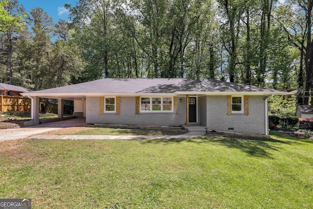 ranch-style house with fence, crawl space, driveway, a carport, and a front yard
