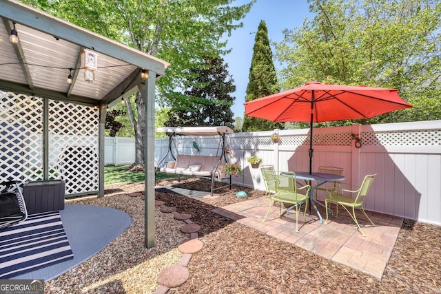 view of yard with a fenced backyard and a patio