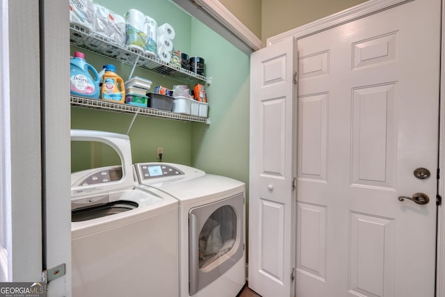 laundry room with washing machine and dryer and laundry area