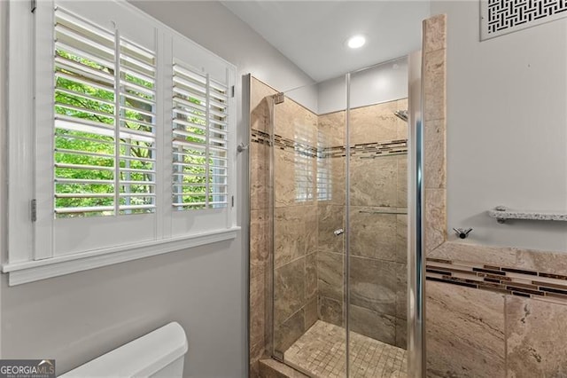4044 Ashentree Dr, Brookhaven, GA 30341 - bathroom with recessed lighting, a shower stall, and toilet