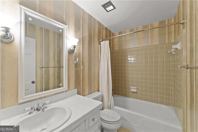4044 Ashentree Dr, Brookhaven, GA 30341 - bathroom featuring toilet, vanity, and shower / bath combo with shower curtain
