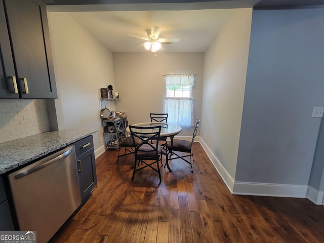 475 Willard Ave SW, Atlanta, GA 30310 - dining room with dark wood finished floors, a ceiling fan, and baseboards