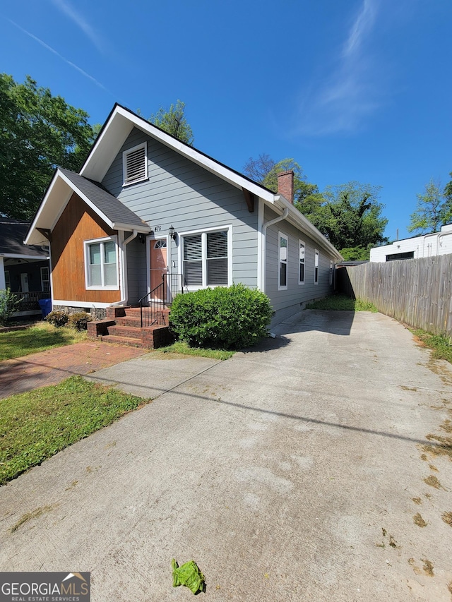 475 Willard Ave SW, Atlanta, GA 30310 - bungalow-style house with a chimney and fence
