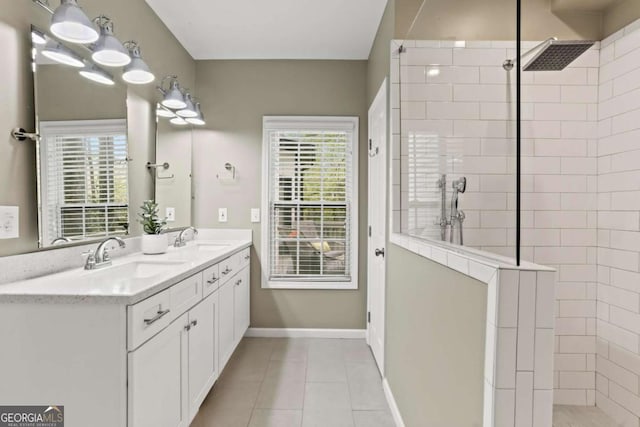 2015 Chelton Way SE, Smyrna, GA 30080 - bathroom with walk in shower, a wealth of natural light, tile patterned floors, and a sink