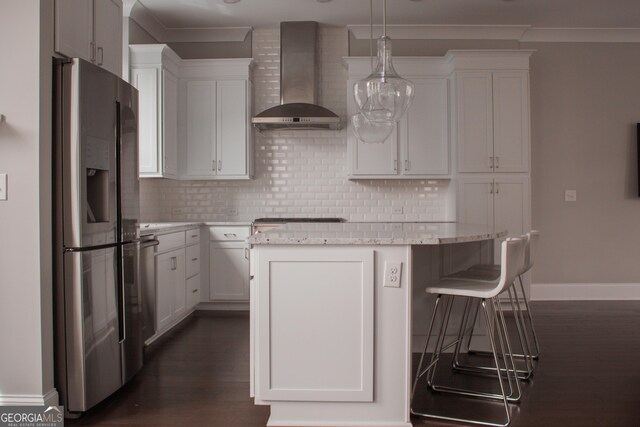 600 Broadview Ter NE, Atlanta, GA 30324 - kitchen featuring wall chimney range hood, tasteful backsplash, stainless steel refrigerator with ice dispenser, dark wood-style flooring, and a kitchen island