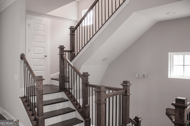 600 Broadview Ter NE, Atlanta, GA 30324 - stairs with lofted ceiling and baseboards