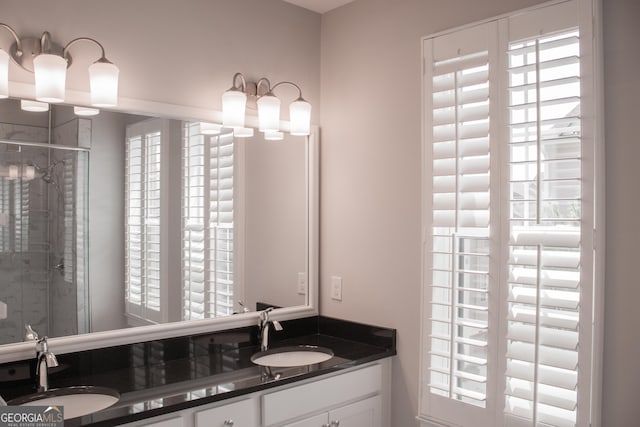 600 Broadview Ter NE, Atlanta, GA 30324 - bathroom with a sink, double vanity, and a stall shower
