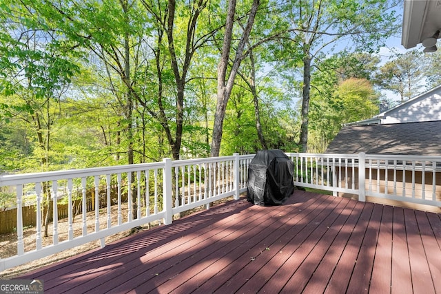 wooden terrace with grilling area