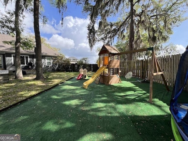 1163 Bristol Hammock Cir, Kingsland, GA 31548 - view of play area with a fenced backyard