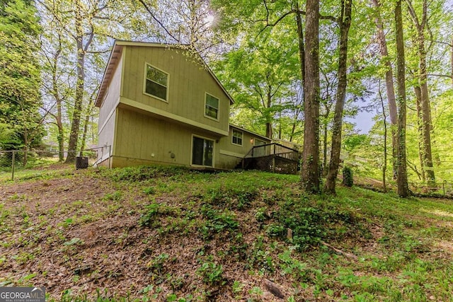 5307 Jay Way NW, Lilburn, GA 30047 - rear view of house featuring fence and a deck