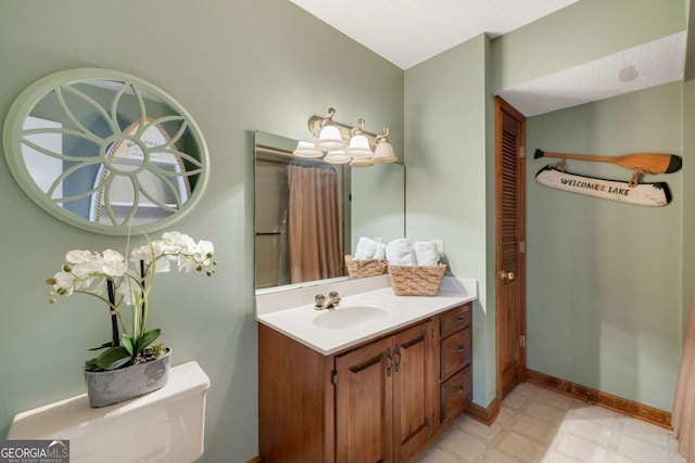 736 Cedar Ridge Rd, Hartwell, GA 30643 - bathroom with tile patterned floors, baseboards, vanity, and toilet