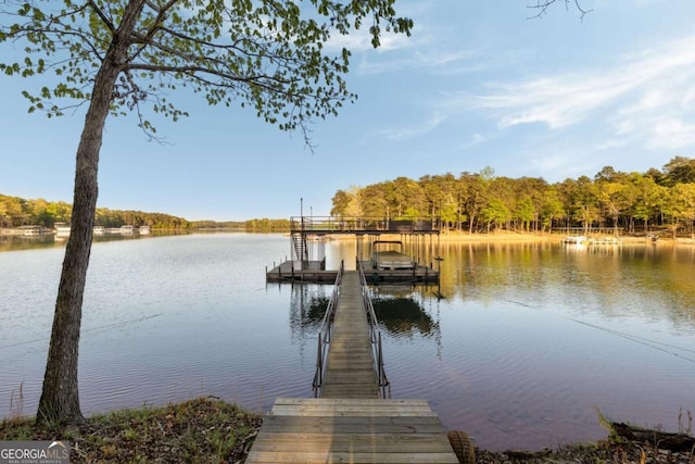 736 Cedar Ridge Rd, Hartwell, GA 30643 - view of dock featuring boat lift, a water view, and a wooded view