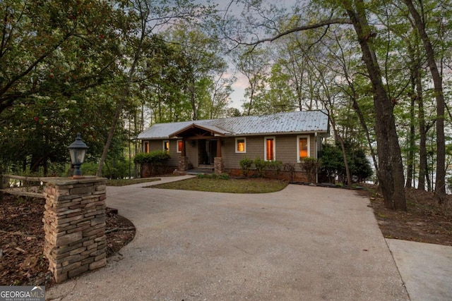 736 Cedar Ridge Rd, Hartwell, GA 30643 - view of front facade featuring concrete driveway and metal roof