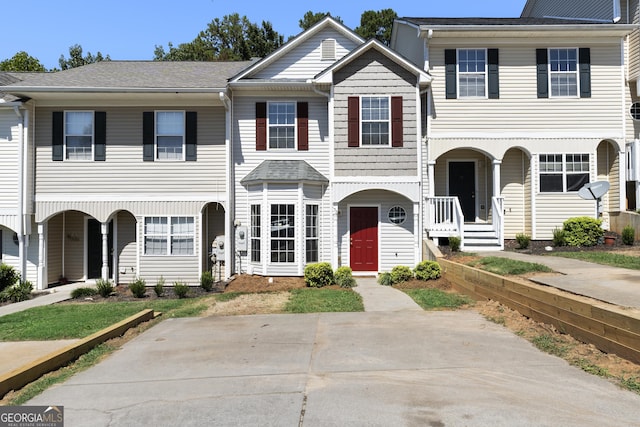 multi unit property featuring a porch