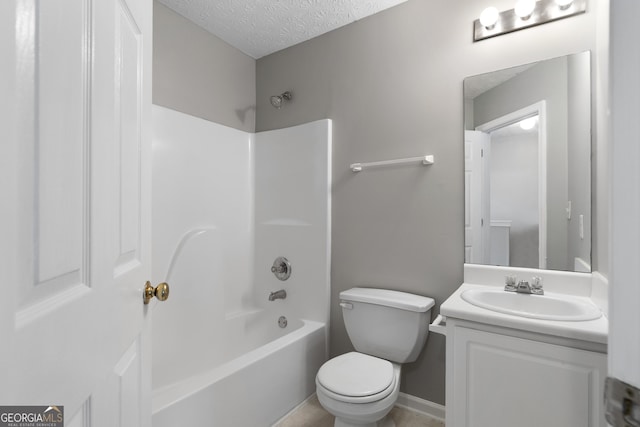 bathroom with toilet, shower / bathtub combination, vanity, and a textured ceiling
