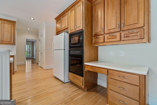 kitchen featuring black appliances, light wood-type flooring, crown molding, light countertops, and recessed lighting