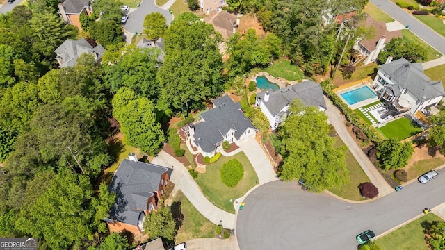 aerial perspective of suburban area with a pool area