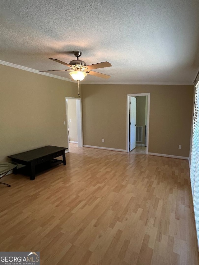 1640 Hg Miles Dr NE, Townsend, GA 31331 - unfurnished room featuring ceiling fan, baseboards, light wood-style floors, and ornamental molding