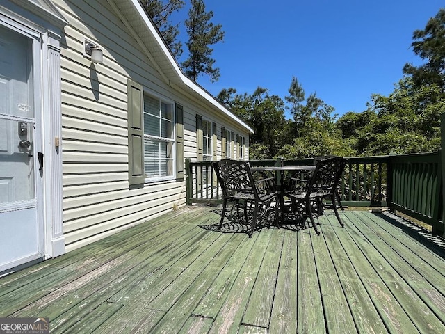 1640 Hg Miles Dr NE, Townsend, GA 31331 - deck featuring outdoor dining area