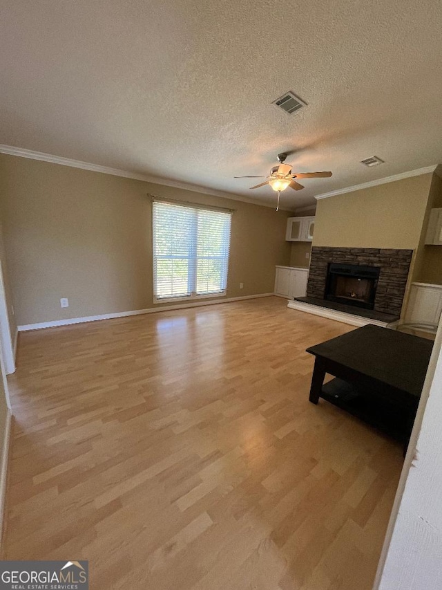 1640 Hg Miles Dr NE, Townsend, GA 31331 - unfurnished living room with light wood-style floors, baseboards, and ornamental molding