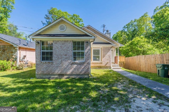 2212 Butner Rd SW, Atlanta, GA 30331 - rear view of house featuring a chimney and brick siding