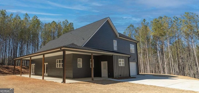 1250 Hayes Mill Rd, Carrollton, GA 30117 - view of front of house featuring concrete driveway and a garage
