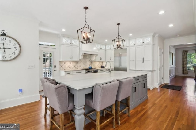 3115 Corsair Curv, Cumming, GA 30040 - kitchen featuring stainless steel built in fridge, stove, white cabinetry, light countertops, and recessed lighting