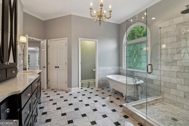 3115 Corsair Curv, Cumming, GA 30040 - full bath featuring vanity, a stall shower, a freestanding bath, a chandelier, and crown molding