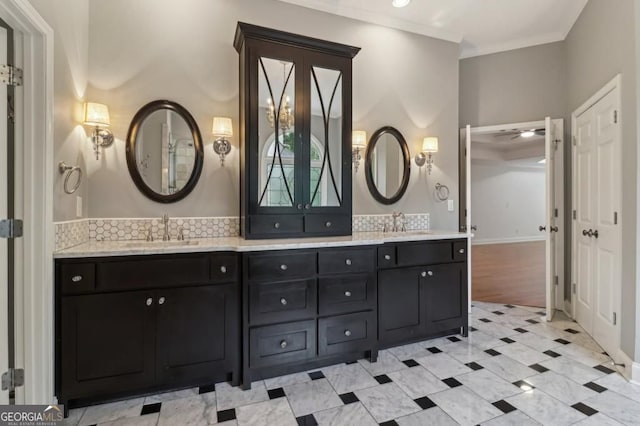 3115 Corsair Curv, Cumming, GA 30040 - bathroom with double vanity, crown molding, and baseboards