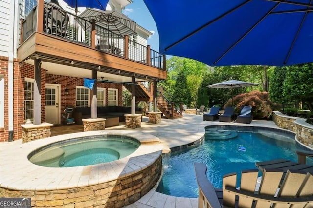 3115 Corsair Curv, Cumming, GA 30040 - view of swimming pool featuring stairs, a patio area, and a pool with connected hot tub