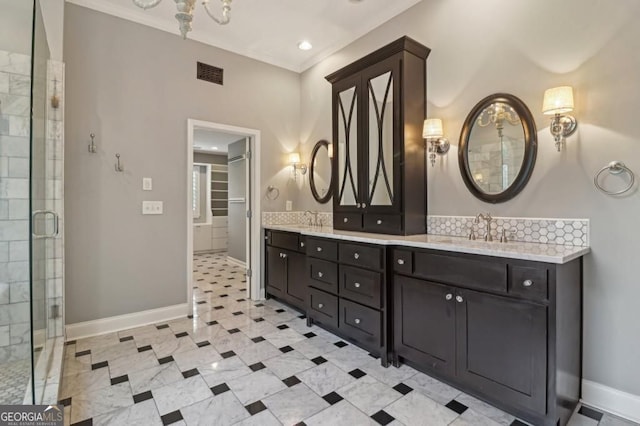 3115 Corsair Curv, Cumming, GA 30040 - bathroom featuring ornamental molding, a shower stall, double vanity, baseboards, and a spacious closet