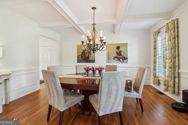 3115 Corsair Curv, Cumming, GA 30040 - dining area featuring coffered ceiling, a decorative wall, a chandelier, beam ceiling, and wood finished floors