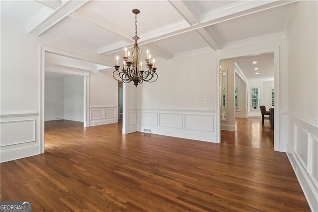 3115 Corsair Curv, Cumming, GA 30040 - unfurnished dining area with a chandelier, coffered ceiling, a decorative wall, wood finished floors, and beamed ceiling