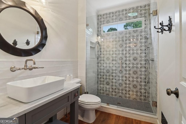 3115 Corsair Curv, Cumming, GA 30040 - bathroom featuring toilet, a tile shower, vanity, and tile walls