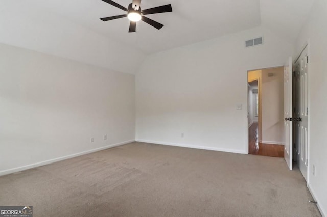 3115 Corsair Curv, Cumming, GA 30040 - empty room with vaulted ceiling, carpet, ceiling fan, and baseboards