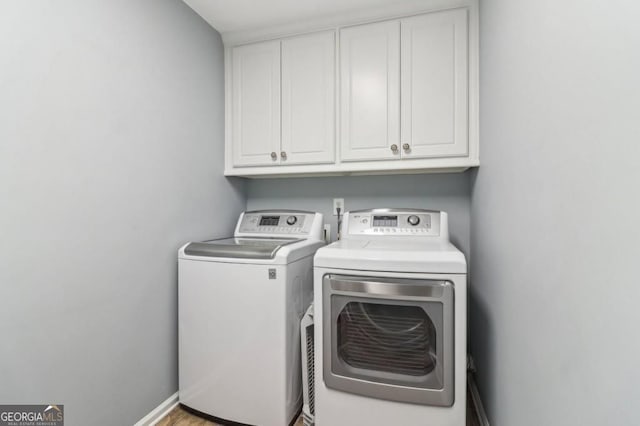 3115 Corsair Curv, Cumming, GA 30040 - washroom with cabinet space and washer and clothes dryer