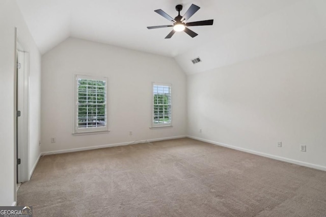 3115 Corsair Curv, Cumming, GA 30040 - empty room with vaulted ceiling, carpet floors, baseboards, and ceiling fan