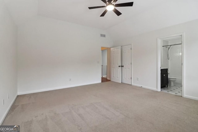 3115 Corsair Curv, Cumming, GA 30040 - unfurnished bedroom with lofted ceiling, carpet flooring, baseboards, and connected bathroom