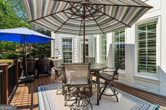 3115 Corsair Curv, Cumming, GA 30040 - sunroom / solarium featuring outdoor dining area, a deck, and wood finished floors
