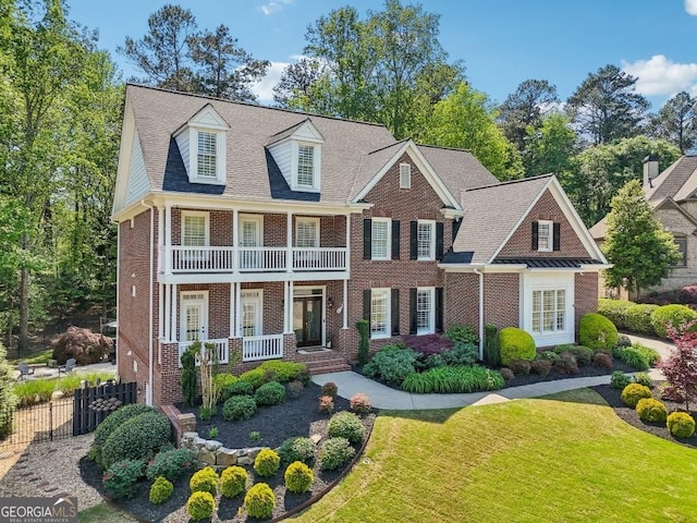 3115 Corsair Curv, Cumming, GA 30040 - view of front facade featuring covered porch, brick siding, and a balcony
