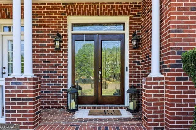 3115 Corsair Curv, Cumming, GA 30040 - property entrance featuring french doors and brick siding