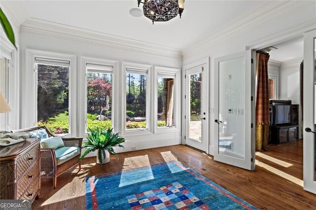 2120 Blackheath Trce, Alpharetta, GA 30005 - sunroom with crown molding, wood finished floors, a deck, and french doors