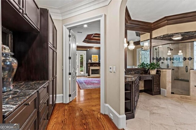 2120 Blackheath Trce, Alpharetta, GA 30005 - bathroom with ornamental molding, vanity, and a shower stall