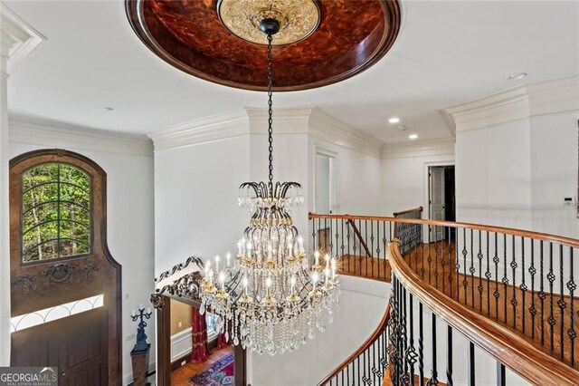 2120 Blackheath Trce, Alpharetta, GA 30005 - corridor with an upstairs landing, a chandelier, recessed lighting, ornamental molding, and wood finished floors