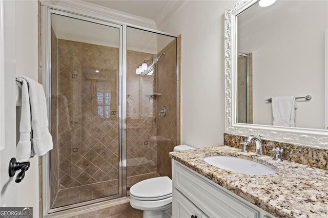 2120 Blackheath Trce, Alpharetta, GA 30005 - bathroom featuring vanity, a shower stall, and crown molding